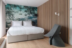 Luxe beddengoed, een kluis op de kamer, individueel gedecoreerd