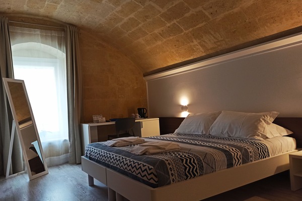 Camera Deluxe con letto matrimoniale o 2 letti singoli, piano elevato (Caveoso) | Biancheria da letto ipoallergenica, materassi in memory foam