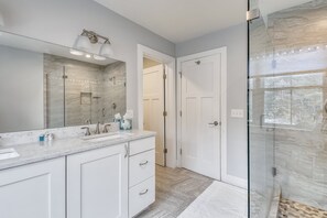 Bathtub, hair dryer, towels