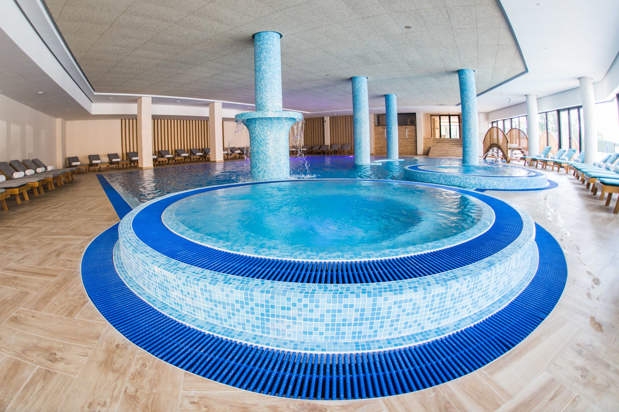 Indoor pool, 2 outdoor pools, open 10:00 AM to 10:00 PM, pool umbrellas