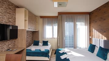 Desk, blackout curtains, soundproofing, free cots/infant beds