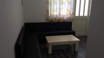 Quadruple Room | Living area