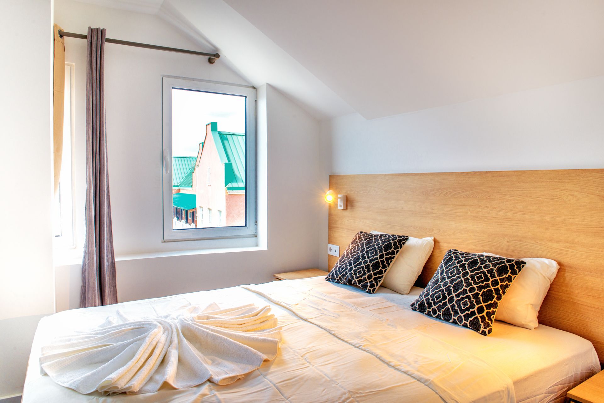 Pillow-top beds, blackout curtains, soundproofing, iron/ironing board