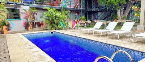 Outdoor pool, open 8:00 AM to 10:00 PM, sun loungers