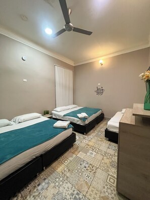 Family Room | Bed sheets - Casa Avelina Boutique Hostel (Santa Marta)