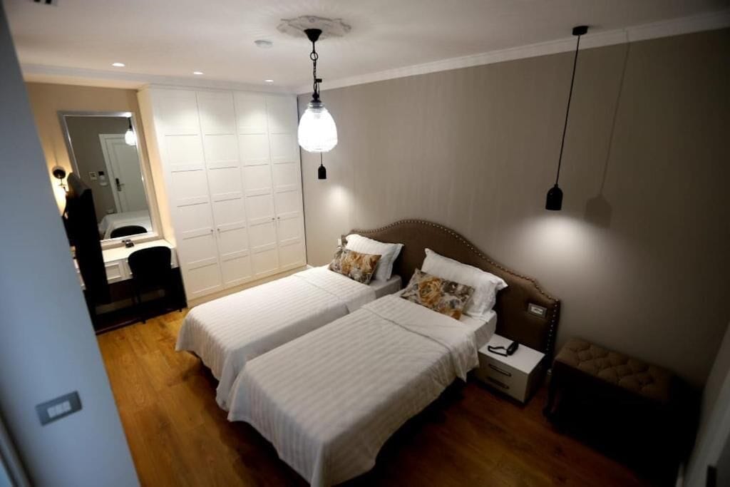 deluxe twin room | minibar, desk, laptop workspace, blackout curtains