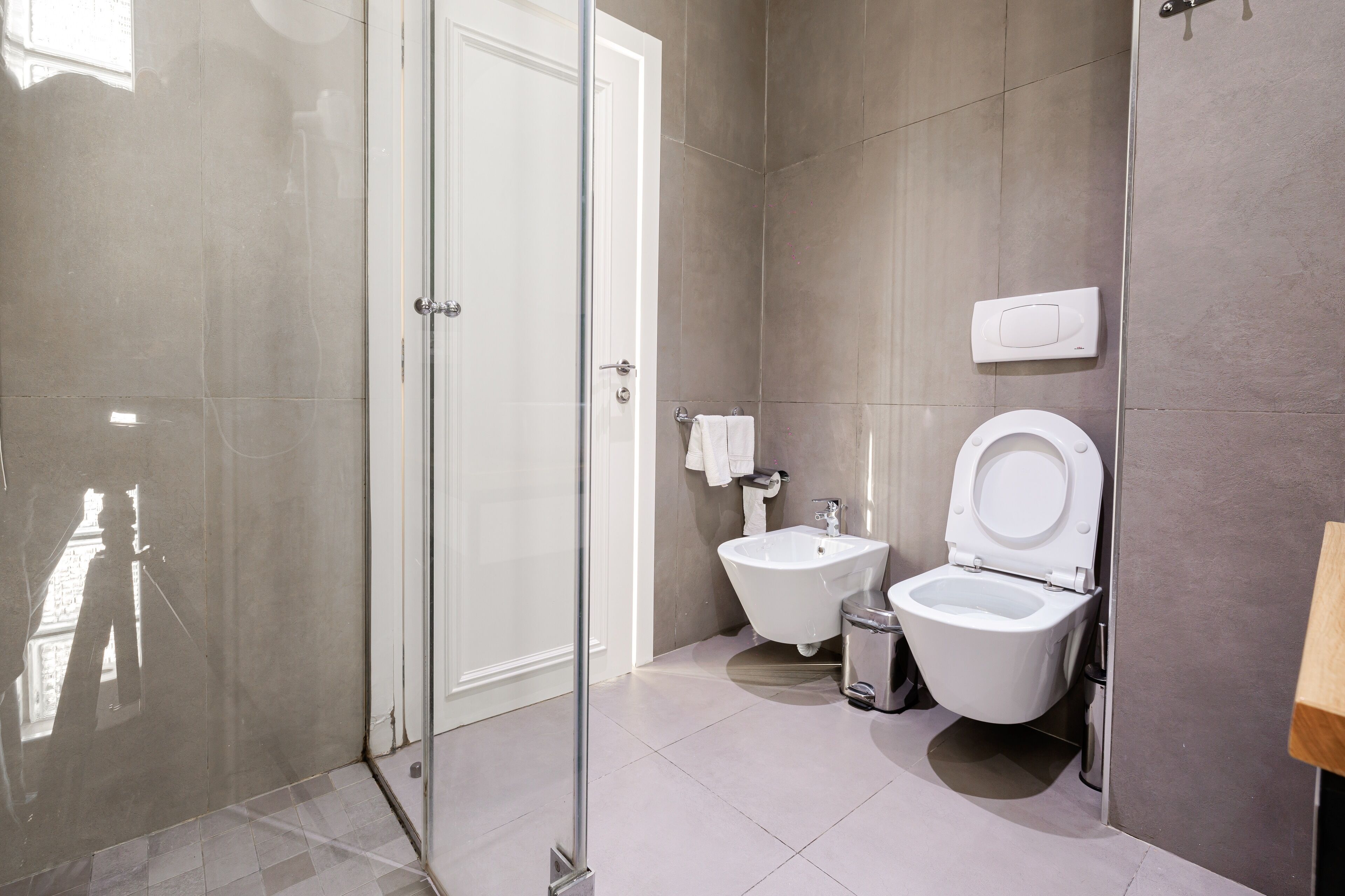 deluxe triple room | bathroom | shower, free toiletries, hair dryer, slippers