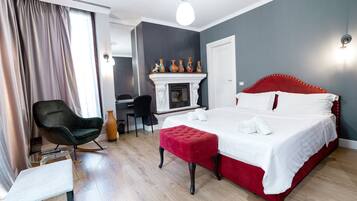 Deluxe Double Room | Minibar, desk, laptop workspace, blackout drapes