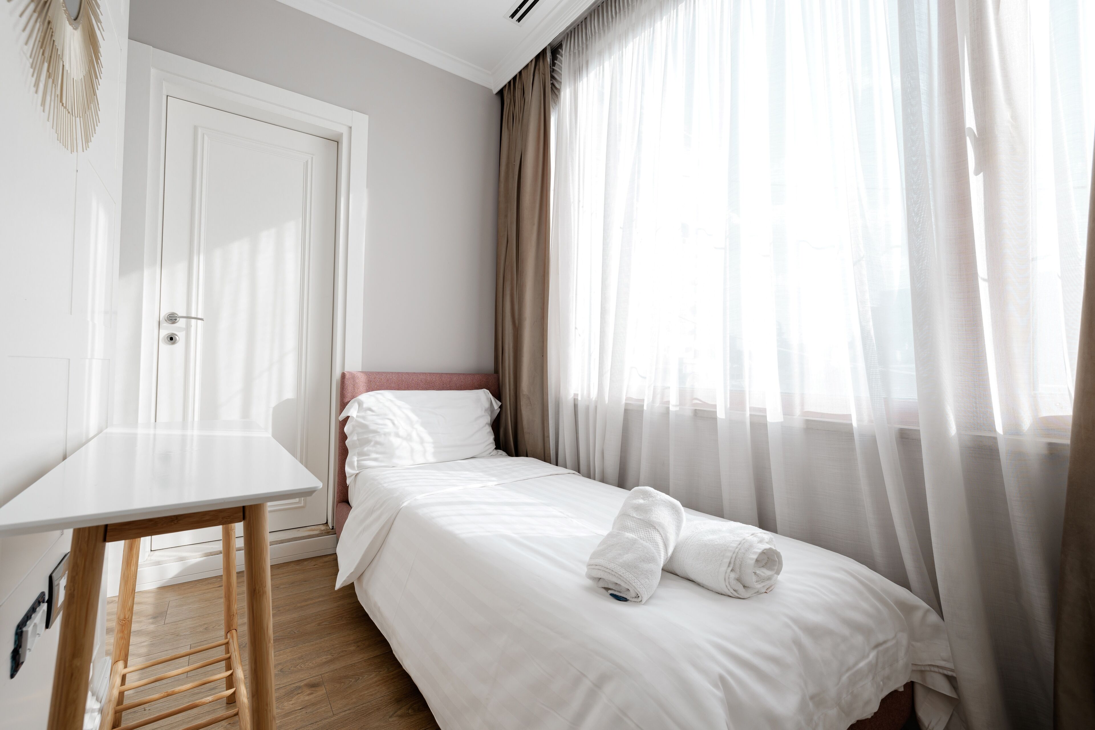 deluxe triple room | minibar, desk, laptop workspace, blackout curtains