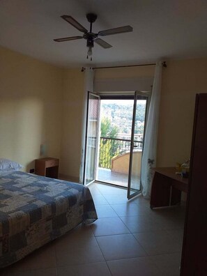 Premium bedding, desk, laptop workspace, blackout curtains