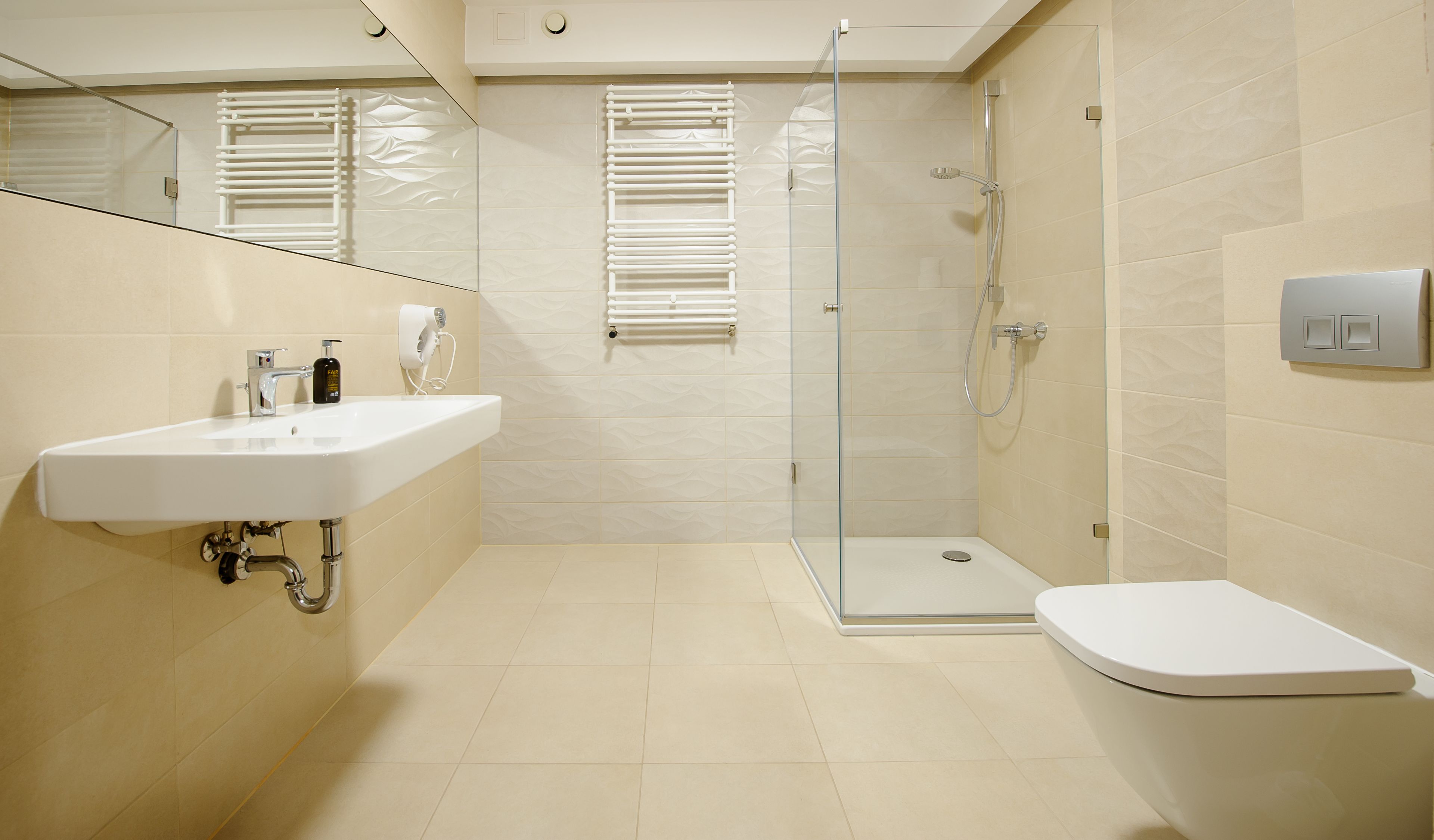 deluxe double or twin room | bathroom | shower, free toiletries, hair dryer, towels