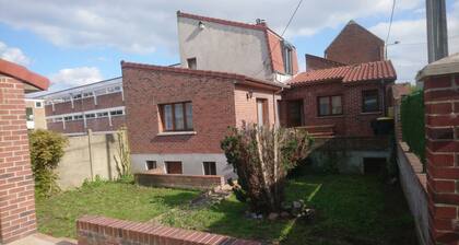 House near the Louvre lens and shops