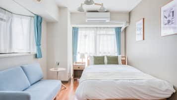 Blackout curtains, iron/ironing board, free WiFi, bed sheets