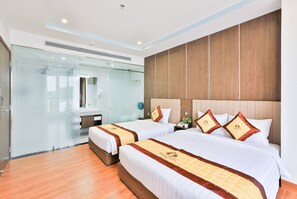 Deluxe Family Room | Premium bedding, minibar, in-room safe, desk - Prague Saigon Airport Hotel (Ho Chi Minh City)