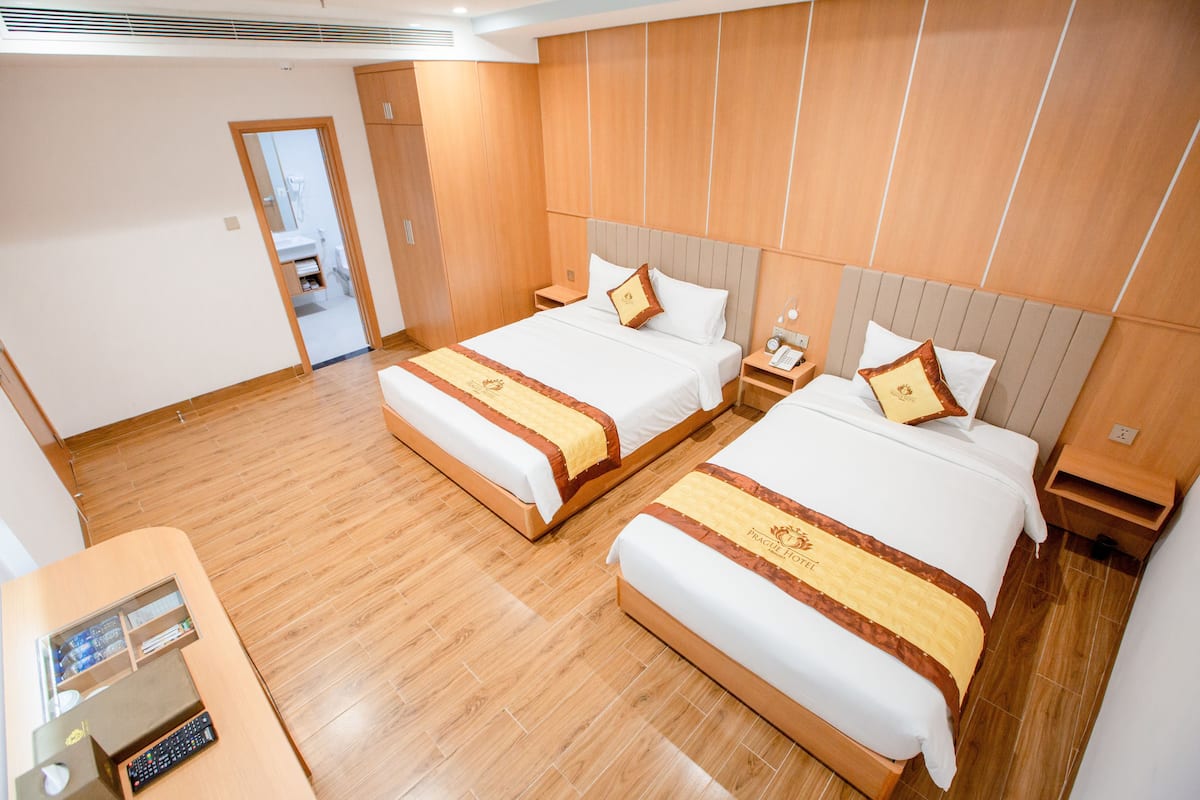Luxe beddengoed, een minibar, een kluis op de kamer, een bureau