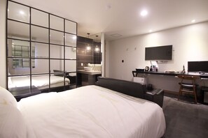 Habitación Premium | Cortinas blackout, wifi gratis y ropa de cama 