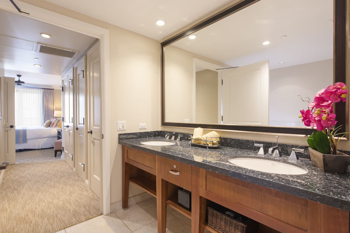 bathtub, hair dryer, towels, soap