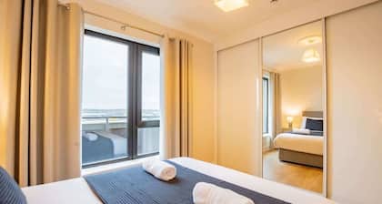 Penthouse with Harbour and Panoramic Water Views.