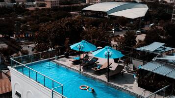 Outdoor pool, pool umbrellas, sun loungers