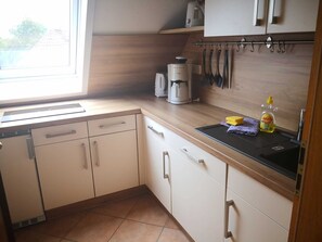 Fridge, dishwasher, coffee/tea maker, electric kettle