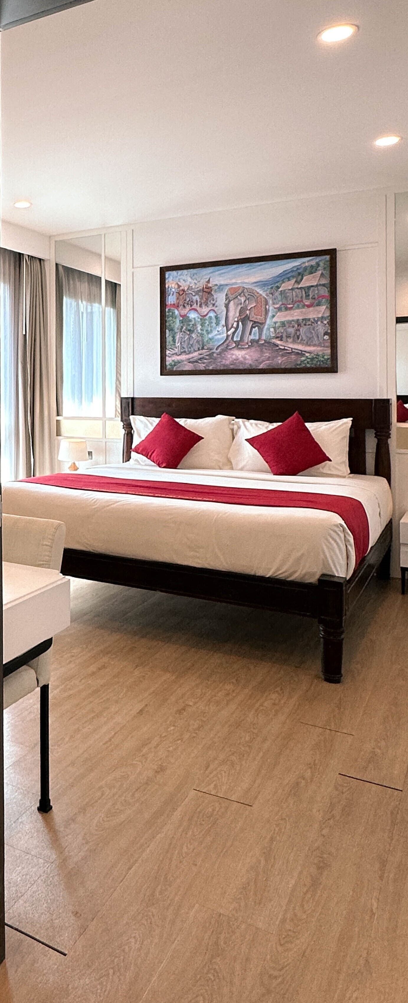 Deluxe Duplex | Free minibar items, in-room safe, desk, blackout curtains