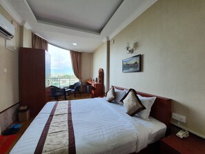 Habitación Deluxe con 1 cama doble o 2 individuales | Minibar, wifi gratis, ropa de cama