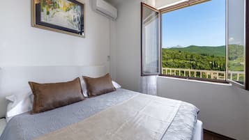 Ropa de cama de alta calidad y tabla de planchar con plancha