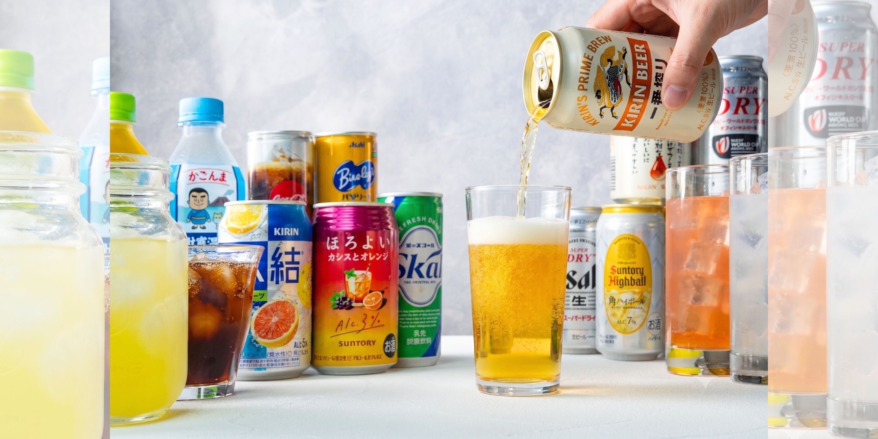 A variety of beverages including cans and bottles, with one can being poured into a glass.