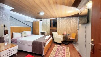 Exclusive Triple Room, 1 Double Bed with Sofa bed, Non Smoking, Kitchenette | Individually decorated, individually furnished, desk, laptop workspace