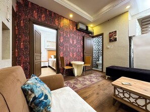 Family Apartment, 1 Bedroom, Kitchen, City View | Living area | 55-inch LCD TV with satellite channels - The New Season Apart (Istanbul)