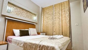 Apartamento família, 1 quarto, cozinha, vista para a cidade | Individualmente decorados, individualmente mobiliados, escrivaninha