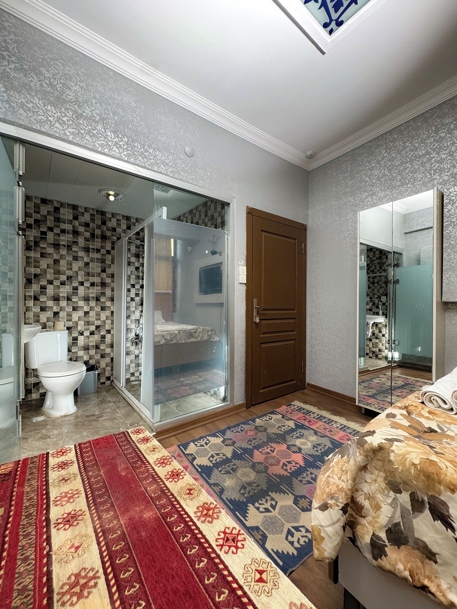 Shower, rainfall showerhead, hair dryer, towels