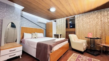 Exclusive Triple Room, 1 Double Bed with Sofa bed, Non Smoking, Kitchenette | 1 bedroom, individually decorated, individually furnished, desk