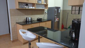 Apartment, 2 Bedrooms | Shared kitchen | Fridge, microwave, oven, stovetop - Scenic View Apartments Kilimani (Nairobi)