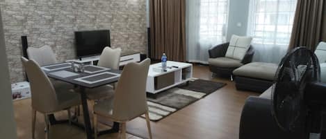 Apartment, 2 Bedrooms | Living room | Flat-screen TV