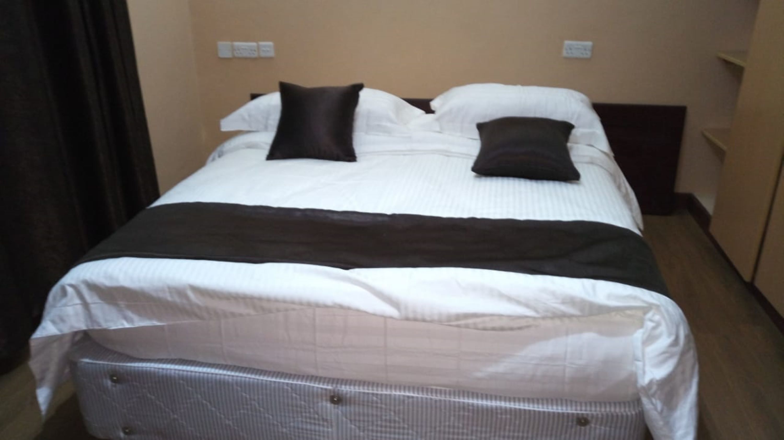 Premium bedding, memory-foam beds, desk, iron/ironing board