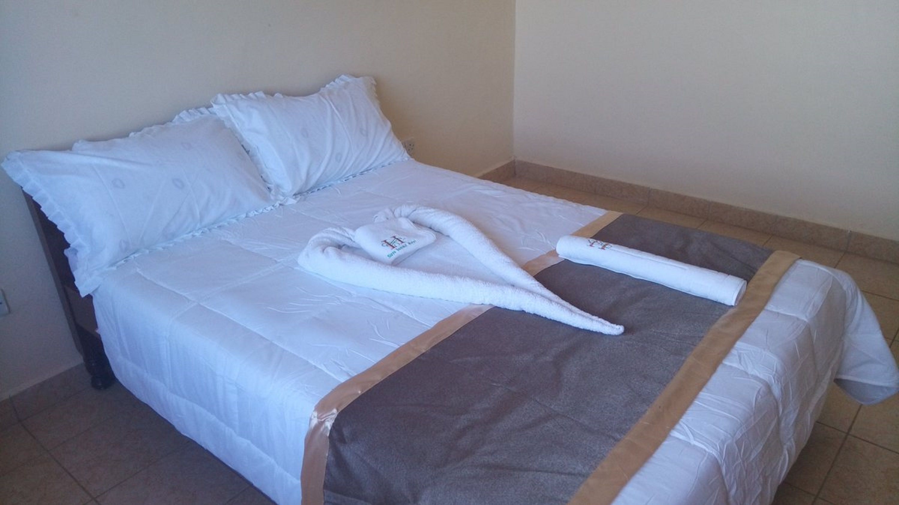 Desk, laptop workspace, free WiFi, bed sheets