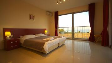 Penthouse, 3 Bedrooms, Balcony, Sea View | Individually decorated, individually furnished, desk, laptop workspace