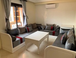 Apartment, 2 Bedrooms | Living area | Flat-screen TV - Appartement Gueliz (Marrakech)