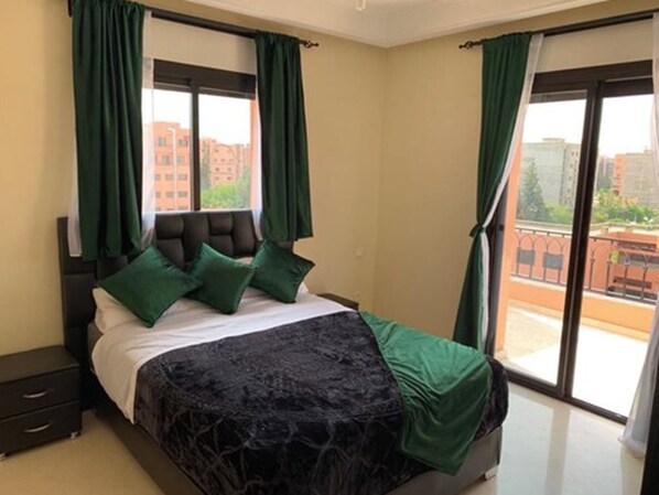 Apartment, 2 Bedrooms | 2 bedrooms, blackout curtains, iron/ironing board, free WiFi - Appartement Gueliz (Marrakech)