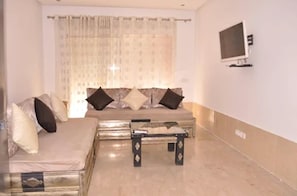 Apartment, 2 Bedrooms | Living room | Flat-screen TV - Appartement Gueliz (Marrakech)