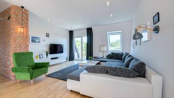 Departamento Confort | Área de sala de estar | Televisión LED y Netflix