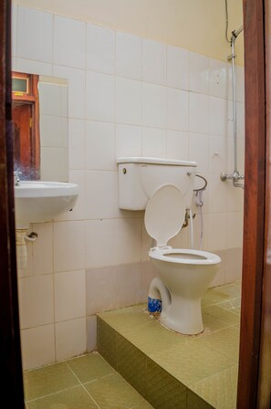 Shower, free toiletries, slippers, towels