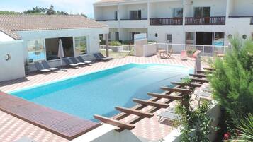 Indoor pool, outdoor pool, open 10:00 AM to 7:30 PM, pool umbrellas