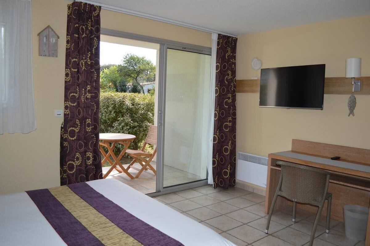 studio (2 personnes) | 1 bedroom, in-room safe, desk, blackout curtains