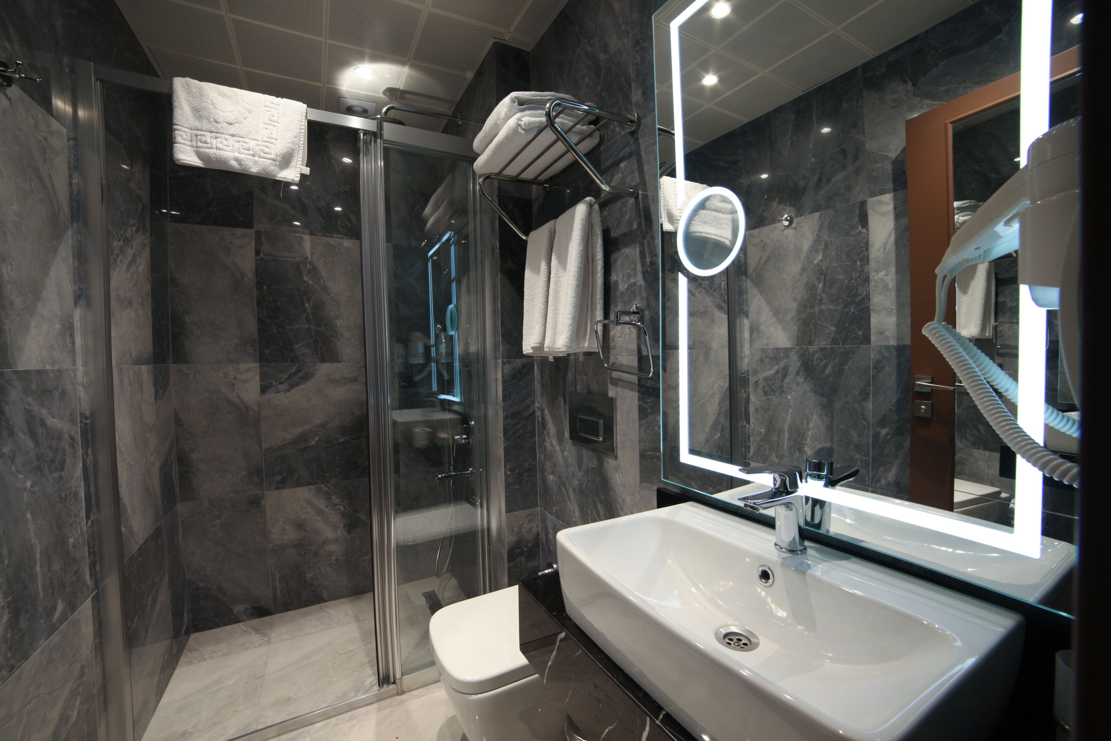 shower, hydromassage showerhead, eco-friendly toiletries, hair dryer