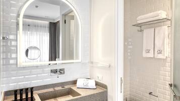 Shower, designer toiletries, hair dryer, bathrobes