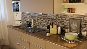 Apartment | Private kitchen | Fridge, stovetop, espresso maker, coffee/tea maker