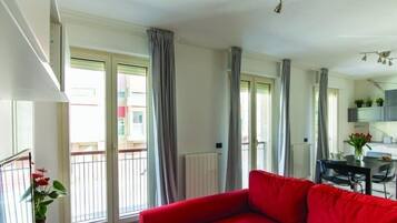 Apartment, 2 Bedrooms | Living area | Flat-screen TV