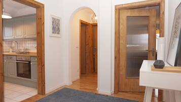 Comfort Apartment (1st floor) | Living area | 40-inch flat-screen TV with satellite channels, TV, MP3 dock